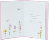 Colorful Meadow Bloom Friend birthday floral greeting card from UK Greetings featuring vibrant flower illustrations.