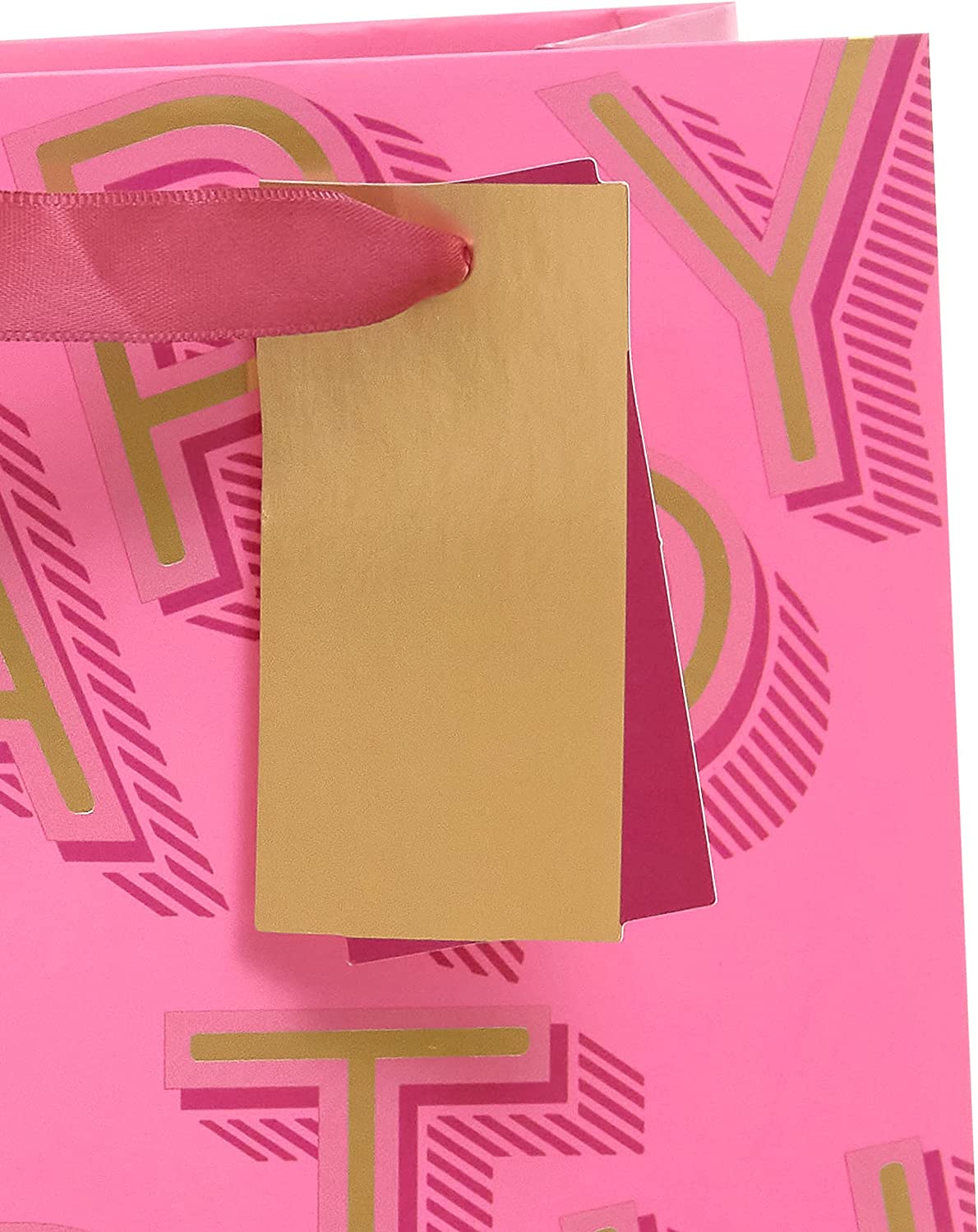 Medium pink gift bag with birthday lettering from UK Greetings, featuring decorative design for gift packaging.