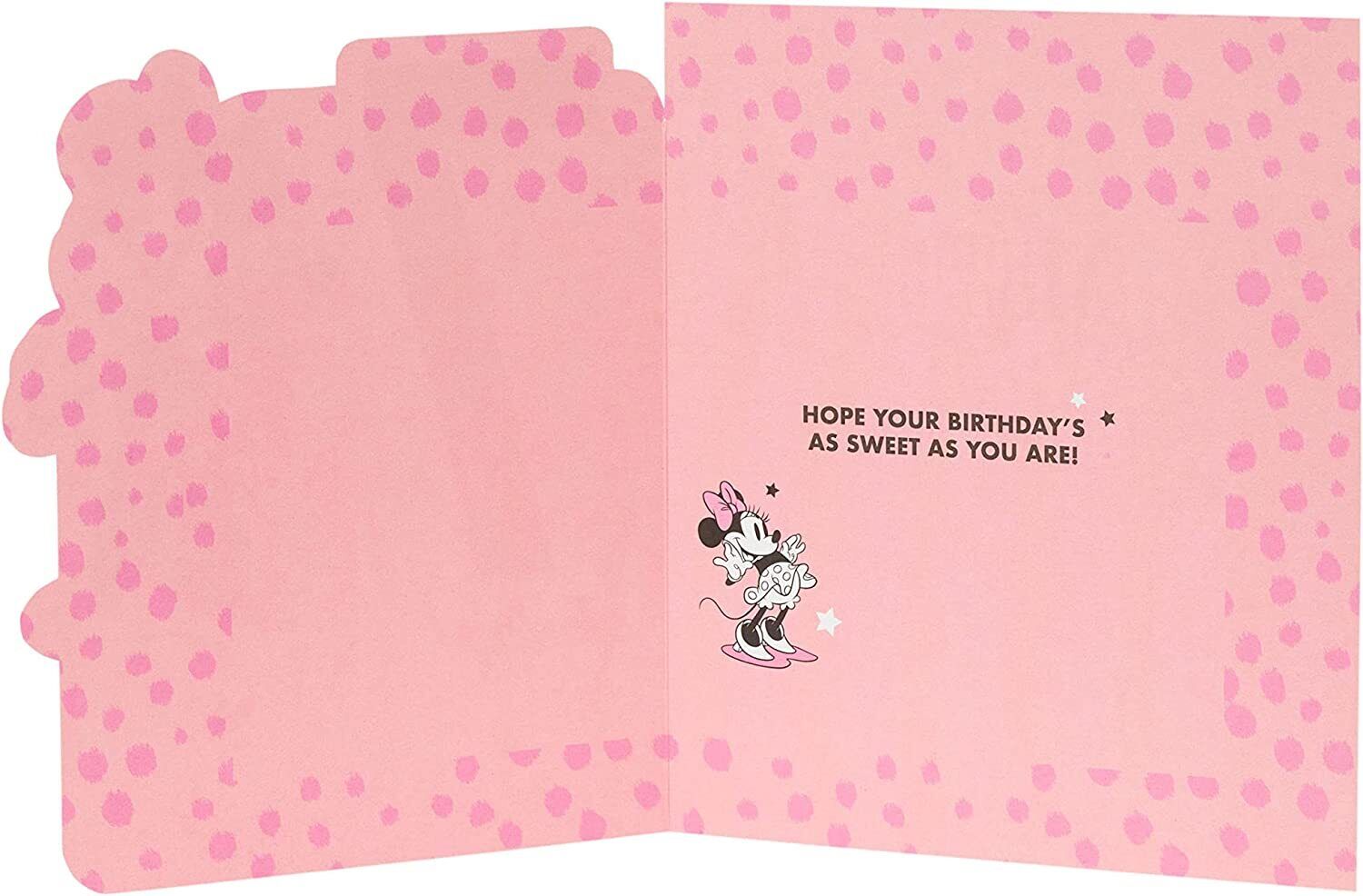 Colorful Minnie Mouse 7th birthday greeting card by UK Greetings featuring Minnie Mouse and festive design for girls' birthday.
