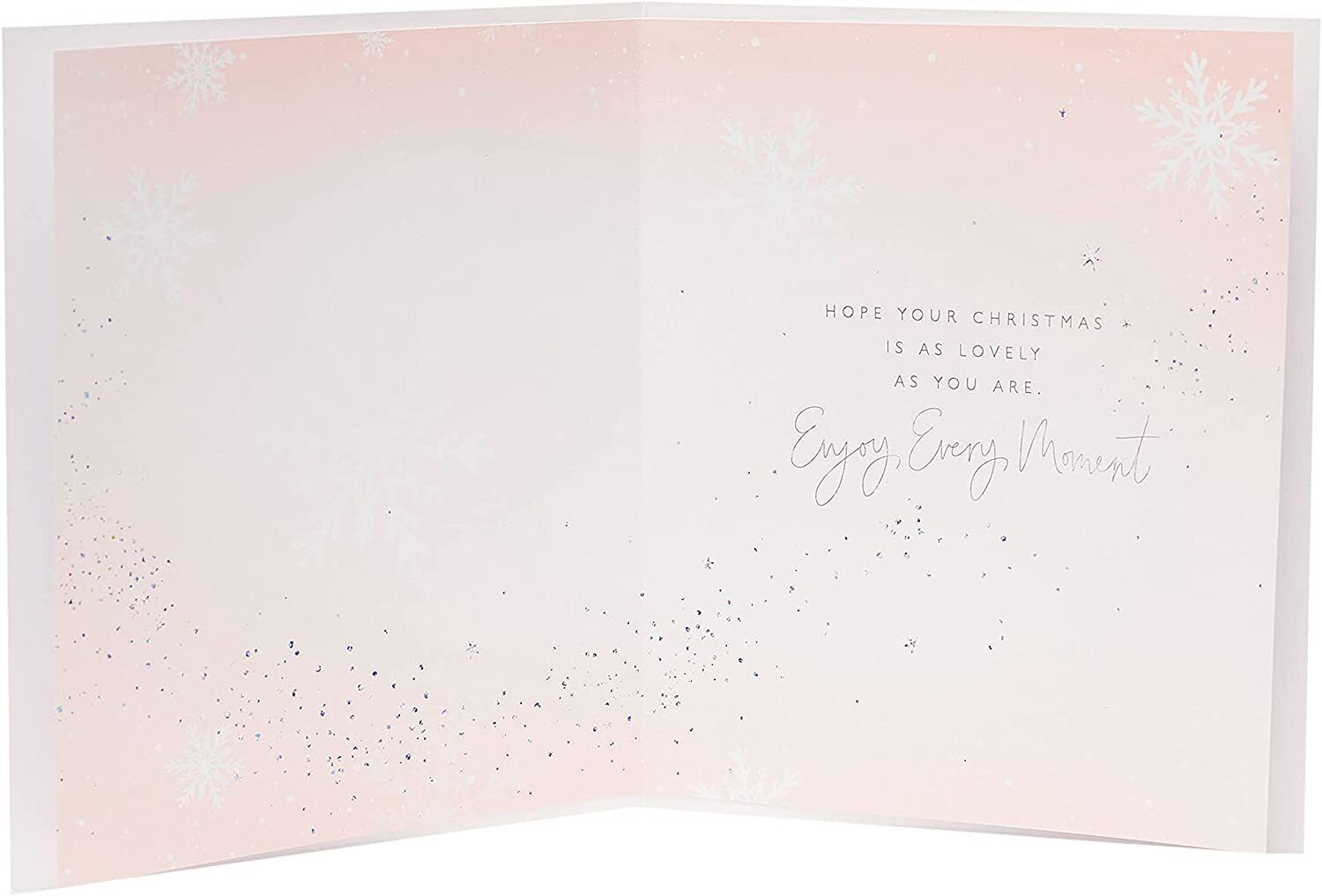 Niece Christmas greeting card featuring a charming chocolate girl design with foiled accents, by UK Greetings.