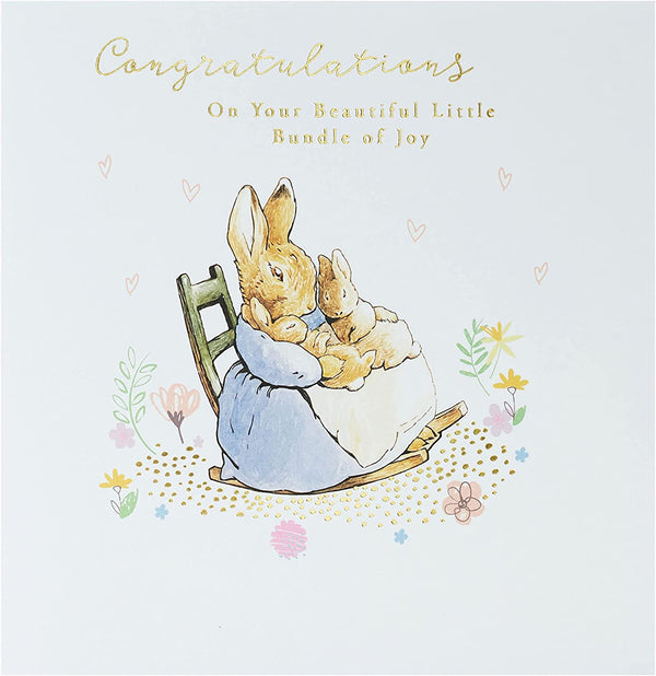 Peter Rabbit-themed new baby congratulations greeting card with adorable illustration, perfect for celebrating a newborn.