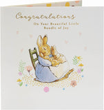 Peter Rabbit new baby congratulations greeting card by UK Greetings featuring adorable rabbit illustration and cheerful design.