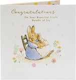 Peter Rabbit New Baby congratulations greeting card by UK Greetings featuring adorable bunny illustration.