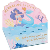Colorful pop-up mermaid sister birthday greeting card with vibrant underwater design, perfect for celebrating a special sister.