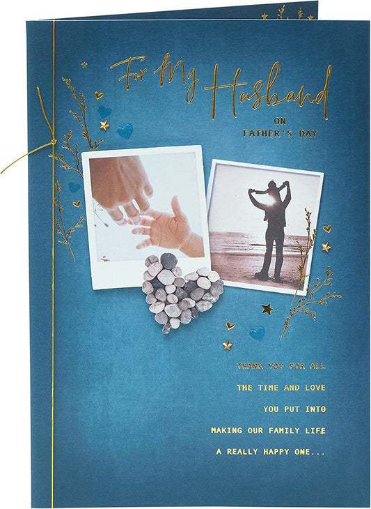 Premium UK Greetings Father's Day greeting card for husband featuring heartfelt message and decorative design on white background.