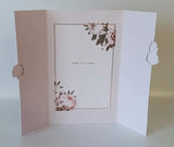 Elegant floral greeting card by UK Greetings with "Thank You" message, featuring colorful flower illustrations.