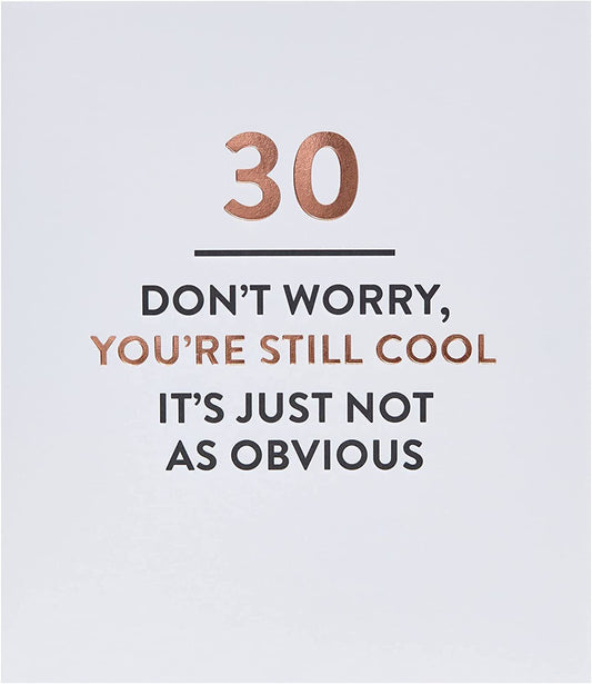 Sassy 30th Still Cool Typography Greeting Card by UK Greetings with bold, playful lettering on a white background.