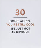 Sassy 30th Still Cool Typography Greeting Card by UK Greetings with bold, playful lettering on a white background.