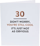 Sassy 30th Still Cool typography greeting card from UK Greetings with bold, colorful lettering on a white background.