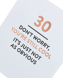 Sassy 30th Still Cool typography greeting card from UK Greetings, featuring bold text and modern design on a white background.