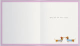 Sausage Dogs Anniversary Love Card from UK Greetings featuring adorable cartoon dachshunds on a romantic greeting card