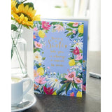 Floral border birthday greeting card with gold foil accents from UK Greetings, featuring a heartfelt message for sisters.