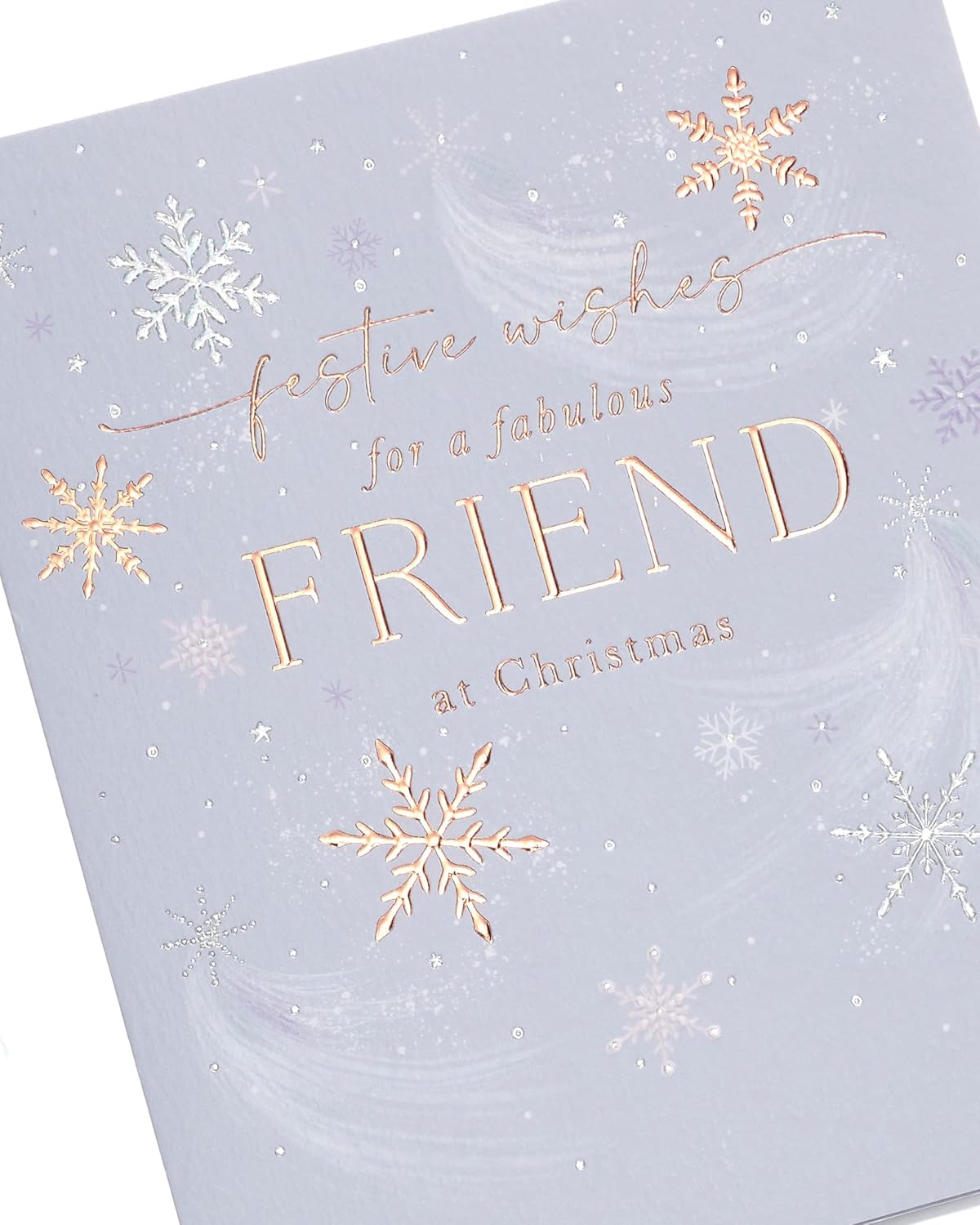 Snowflakes Christmas greeting card for friends featuring festive snowflake designs, UK Greetings brand, ideal for holiday wishes.