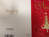 A festive Christmas greeting card from UK Greetings with heartfelt holiday wishes and a colorful holiday design.