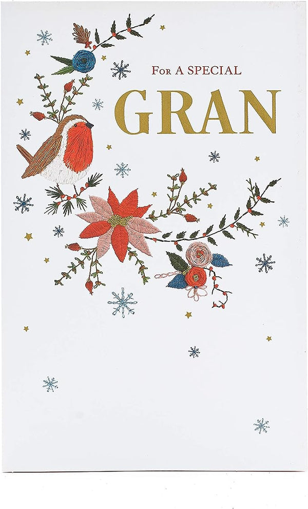 Hand-finished Christmas greeting card with floral embroidery design by UK Greetings, featuring intricate floral embroidery on the front.