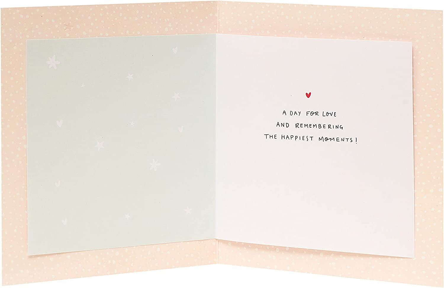 Close-up of UK Greetings Timeless Couple Love Anniversary Card featuring romantic couple illustration and elegant design.
