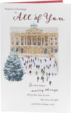 Christmas greeting card featuring winter ice-skating scene with festive design by UK Greetings.