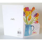 UK Greetings spring flower Easter greeting card for couples, featuring colorful floral design and heartfelt message.