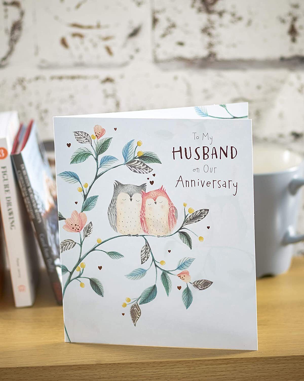 Foil romance anniversary greeting card for husband with heartfelt message, featuring elegant design by UK Greetings.