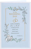 Gold foil wedding greeting card with elegant design, featuring traditional motifs and UK Greetings branding.