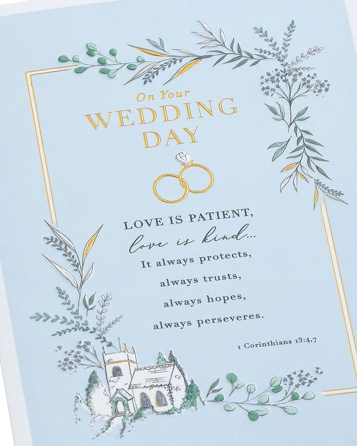 Traditional gold foil wedding greeting card with elegant design, featuring intricate patterns and a festive, celebratory appearance.