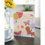 UK Greetings birthday greeting card featuring balloons and butterflies for great-granddaughter, with colorful design and festive imagery.