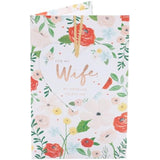 UK Greetings Valentine's Day greeting card for wife with bright floral design, featuring colorful flowers and romantic message.