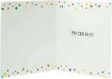 Vibrant multicolour exam good luck greeting card from UK Greetings with cheerful design and encouraging message.