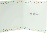 Vibrant multicolour exam good luck greeting card by UK Greetings with colorful design and encouraging message for students.