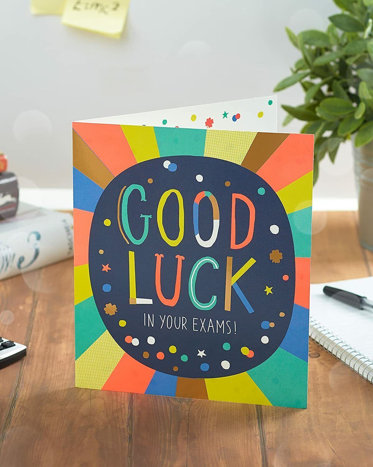 Vibrant multicolour exam good luck greeting card from UK Greetings with cheerful design and encouraging message.