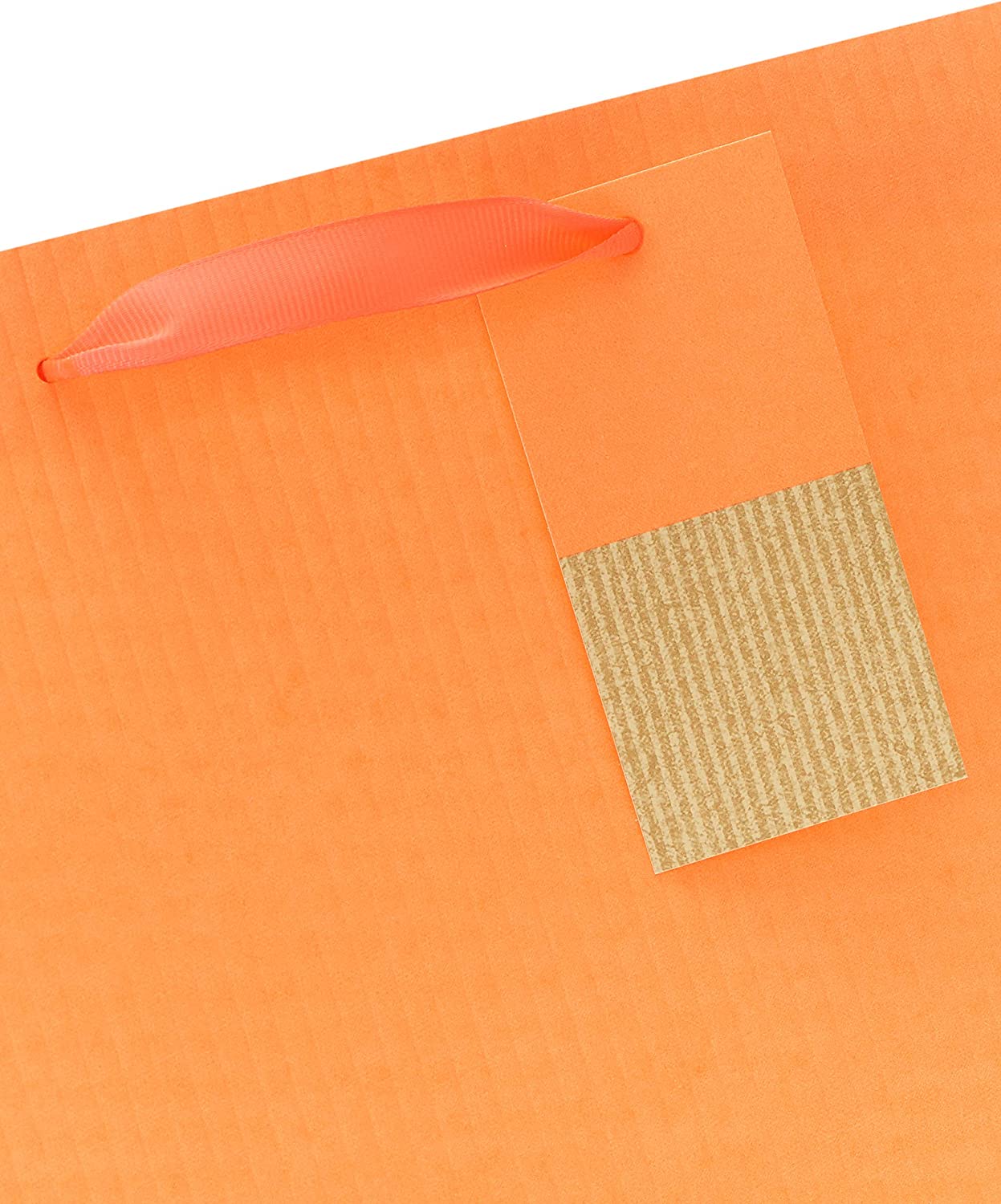 Bright orange UK Greetings gift bag with greeting card design, featuring vibrant colors and large size for special occasions.