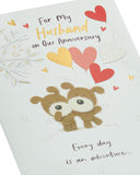 Wedding anniversary greeting card for husband with a lovely design, from UK Greetings, featuring a heartfelt message and decorative details.