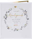 Wedding greeting card with a wreath design for him, her, or friends from UK Greetings, featuring elegant floral artwork.