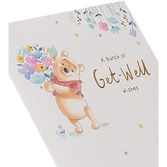 Winnie the Pooh get well greeting card with flower and gold foil accents, from UK Greetings, featuring cheerful cartoon illustration.