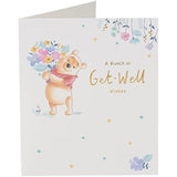 Winnie the Pooh get well greeting card with floral design and gold foil accents, by UK Greetings.