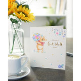 Winnie the Pooh get well greeting card with flower design and gold foil accents, from UK Greetings.