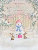 Colorful Wonderful Granddaughter Snowman Christmas greeting card from UK Greetings featuring festive snowman design.