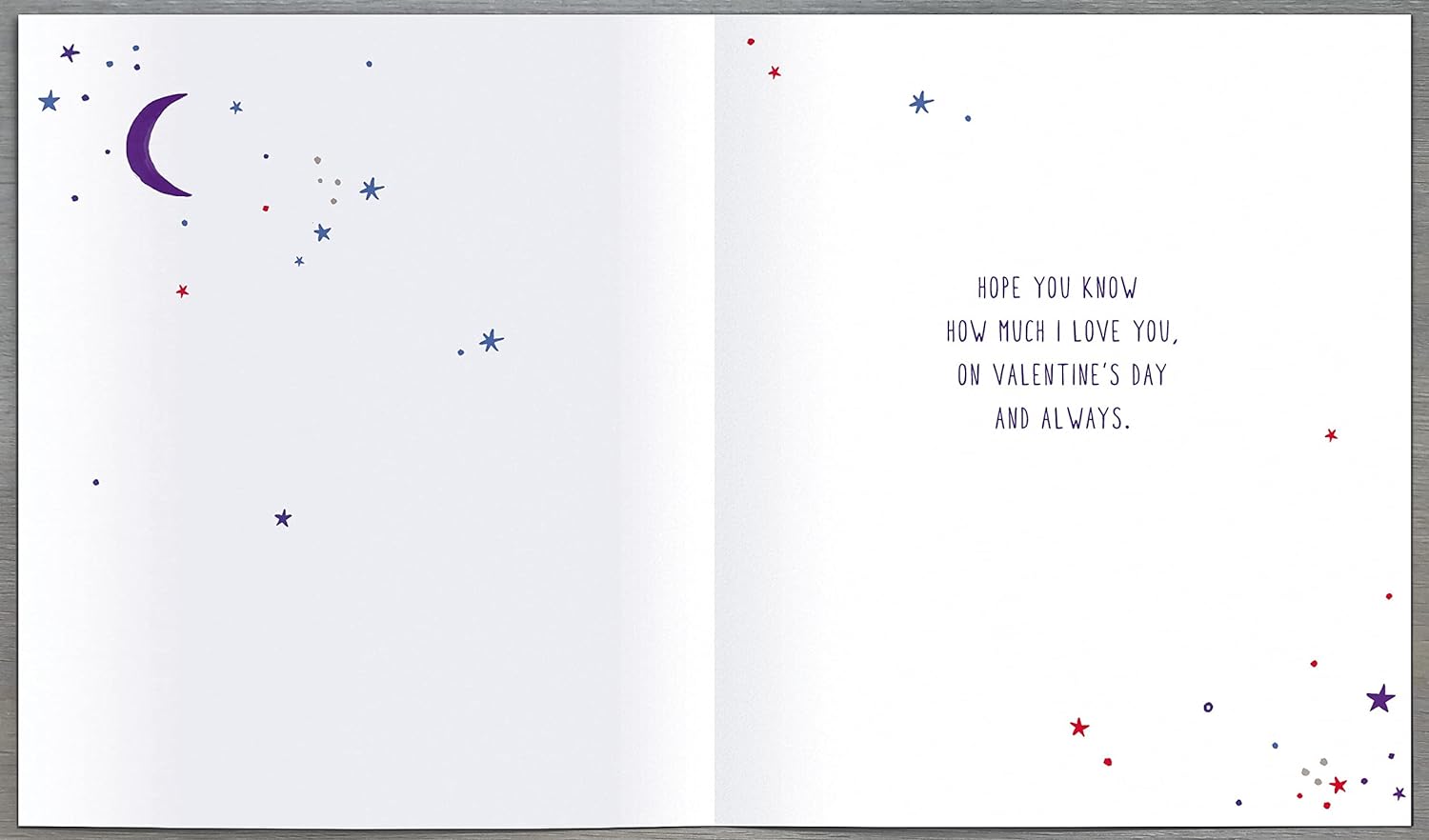 Valentine's Day greeting card featuring the message "You Are My Sun, Moon & Stars" with celestial illustrations, by UK Greetings.
