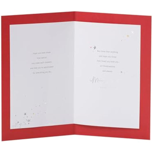 UKG Christmas greeting card for daughter and son-in-law featuring a shooting star foil design on the front.