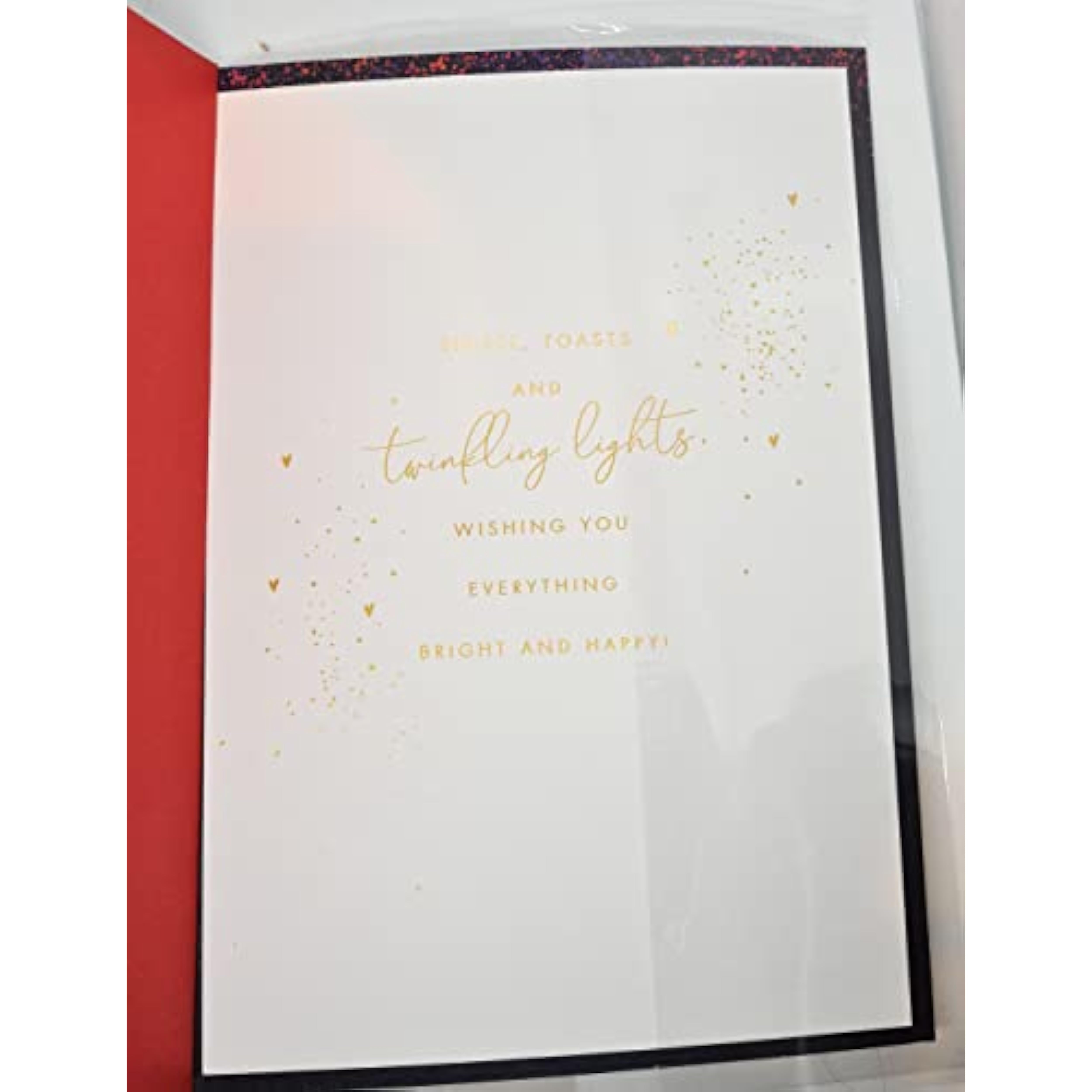 UKG Christmas greeting card for friends featuring festive drinks and gold foil accents, with colorful holiday design.