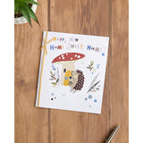 Charming hedgehog design greeting card for him, her, and friends, featuring a cute illustration on the front.