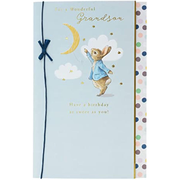 Peter Rabbit birthday greeting card for grandson featuring a blue bow, from UKG, with colorful illustrated design.