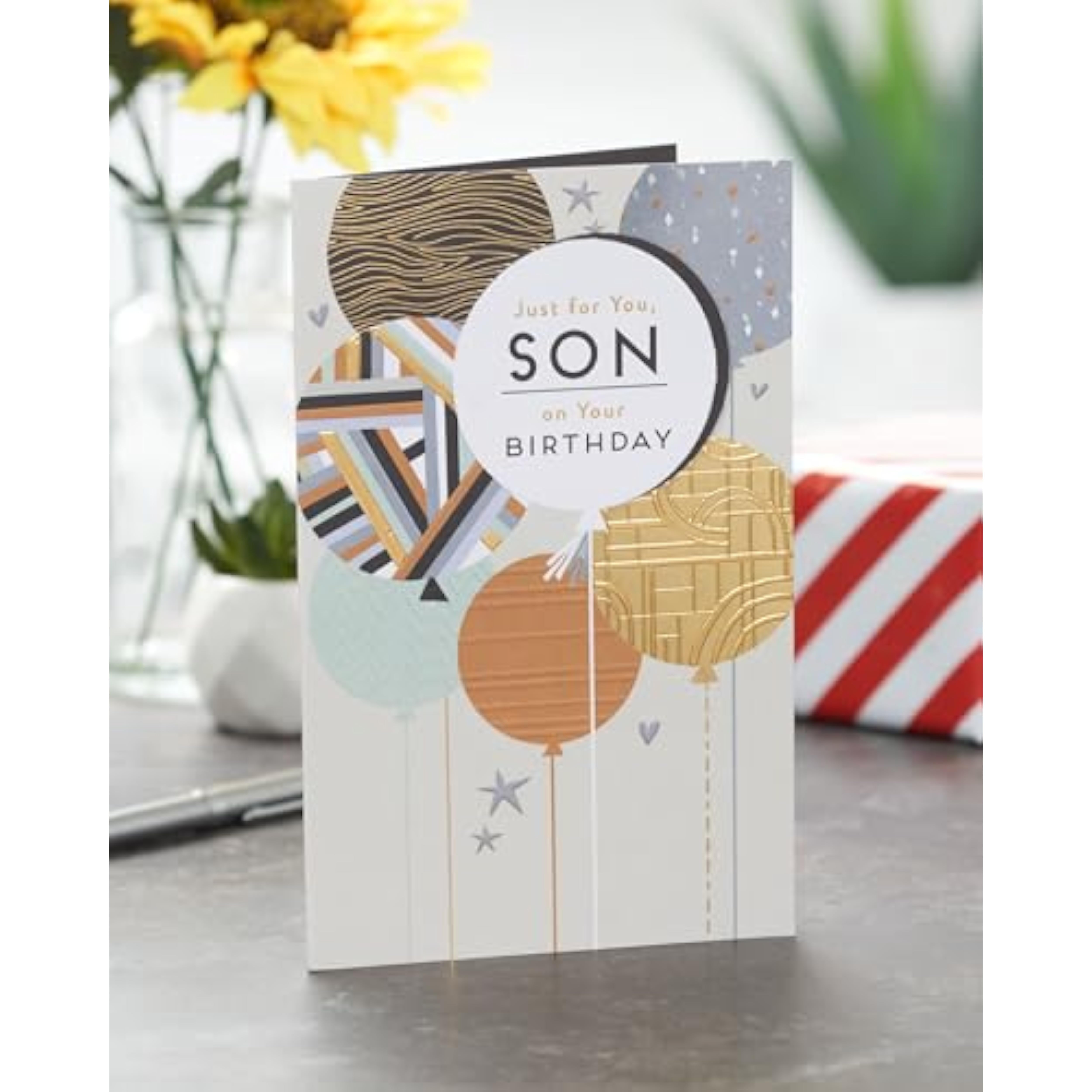 UKG birthday greeting card for son featuring colorful balloons and a fun, cool design suitable for celebrating.