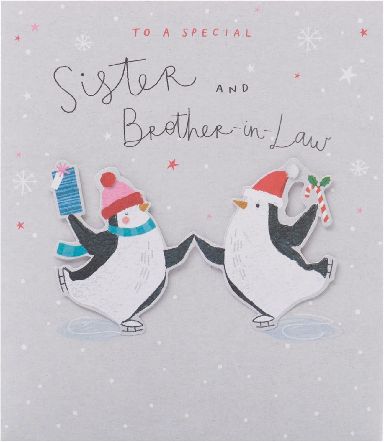 UKG Christmas greeting card featuring cute penguins ice skating, designed for sister and brother-in-law.