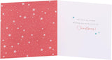UKG Christmas greeting card featuring ice skating penguins, designed for sister and brother-in-law, with festive holiday imagery.