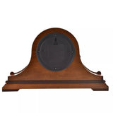 Wooden Napoleon mantel clock by Widdop & Co with classic design and detailed craftsmanship, displayed on a wooden surface.